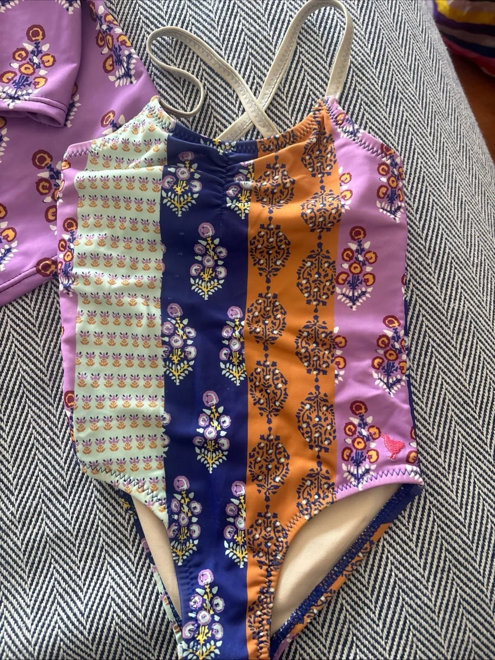 Pink Chicken Purple Floral Rash Guard and Multicolor One-Piece Swimsuit